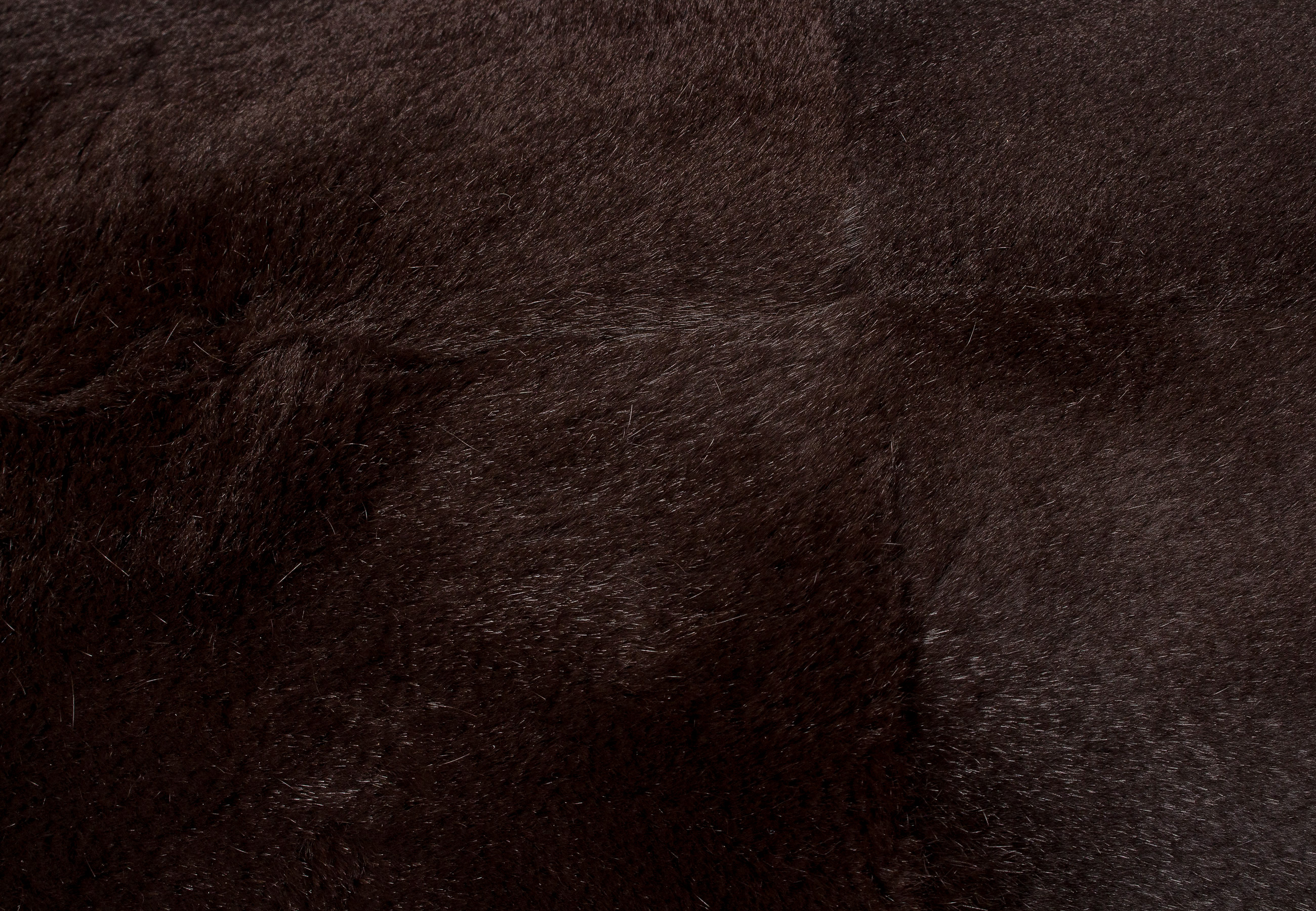 Dunkelbraunes Kanin Fellkissen geschoren Dunkelbraunes Kanin Fellkissen geschoren