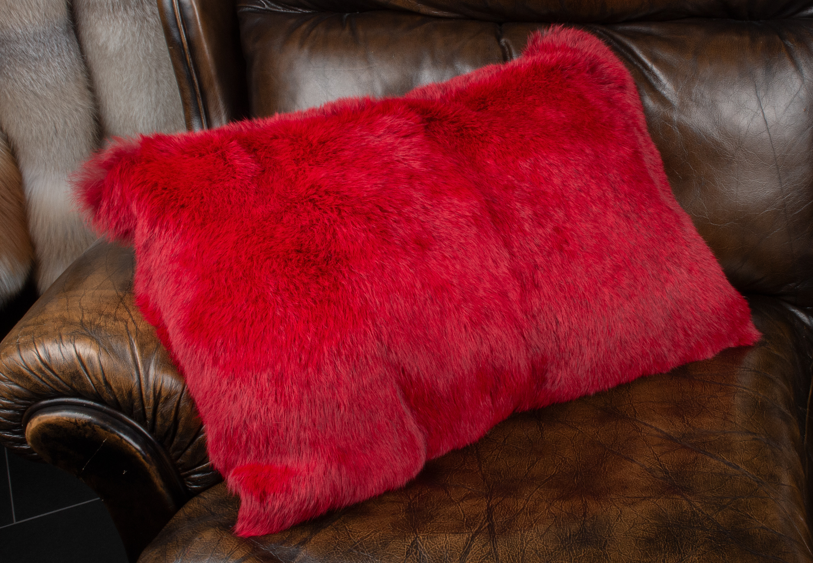 Rotes Kaninchen Fellkissen Rotes Kaninchen Fellkissen