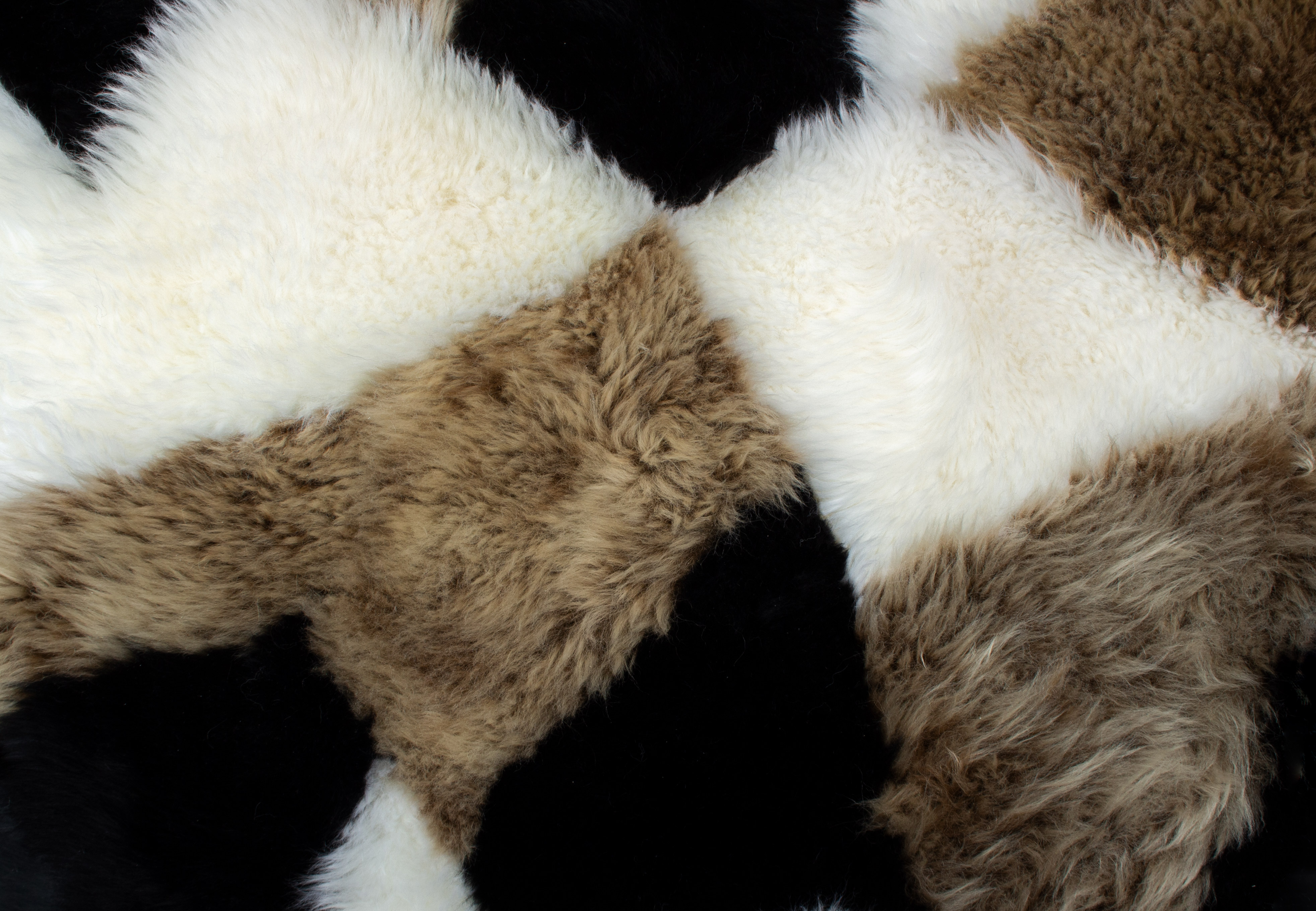 5-4892-Lammfellteppich-Patchwork-Design-Naturfell Lammfellteppich im Patchwork-Design