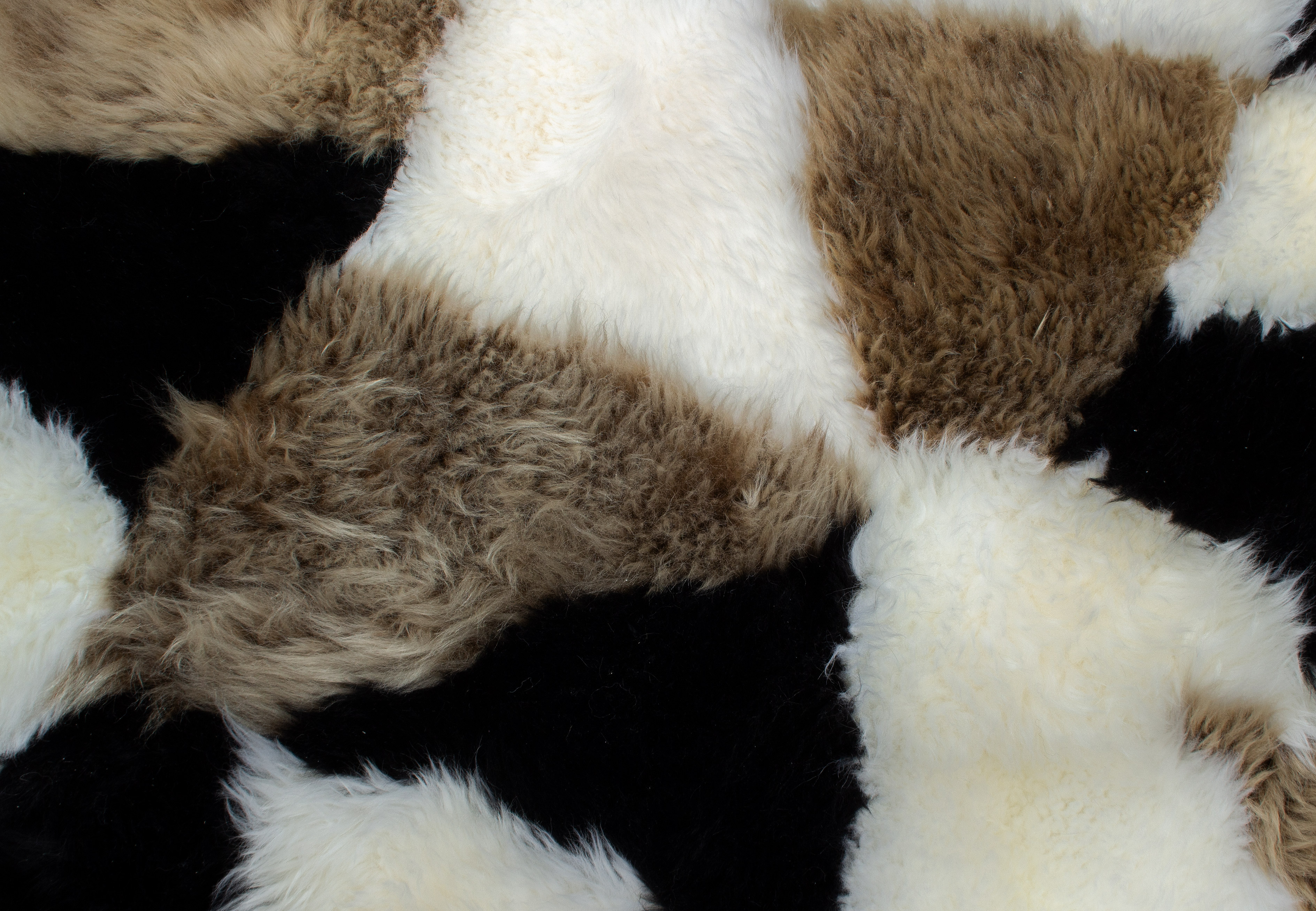 4-4892-Lammfellteppich-Patchwork-Design-Naturfell Lammfellteppich im Patchwork-Design